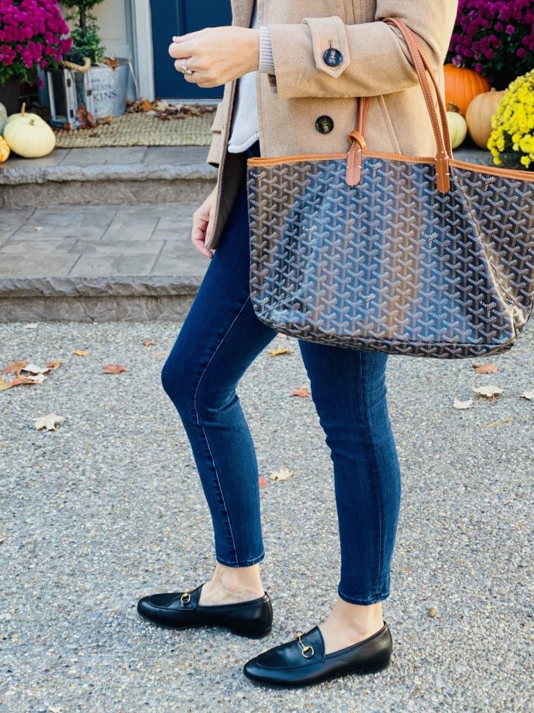 Side view of girl carrying tote