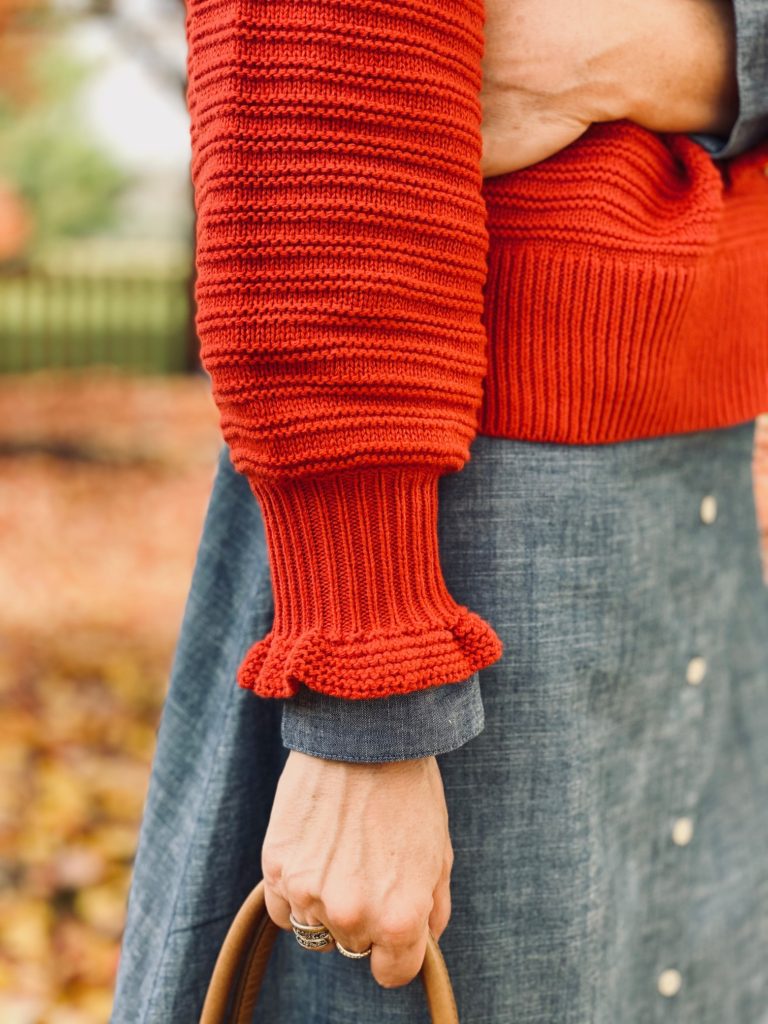 Wrist sweater ruffle detail